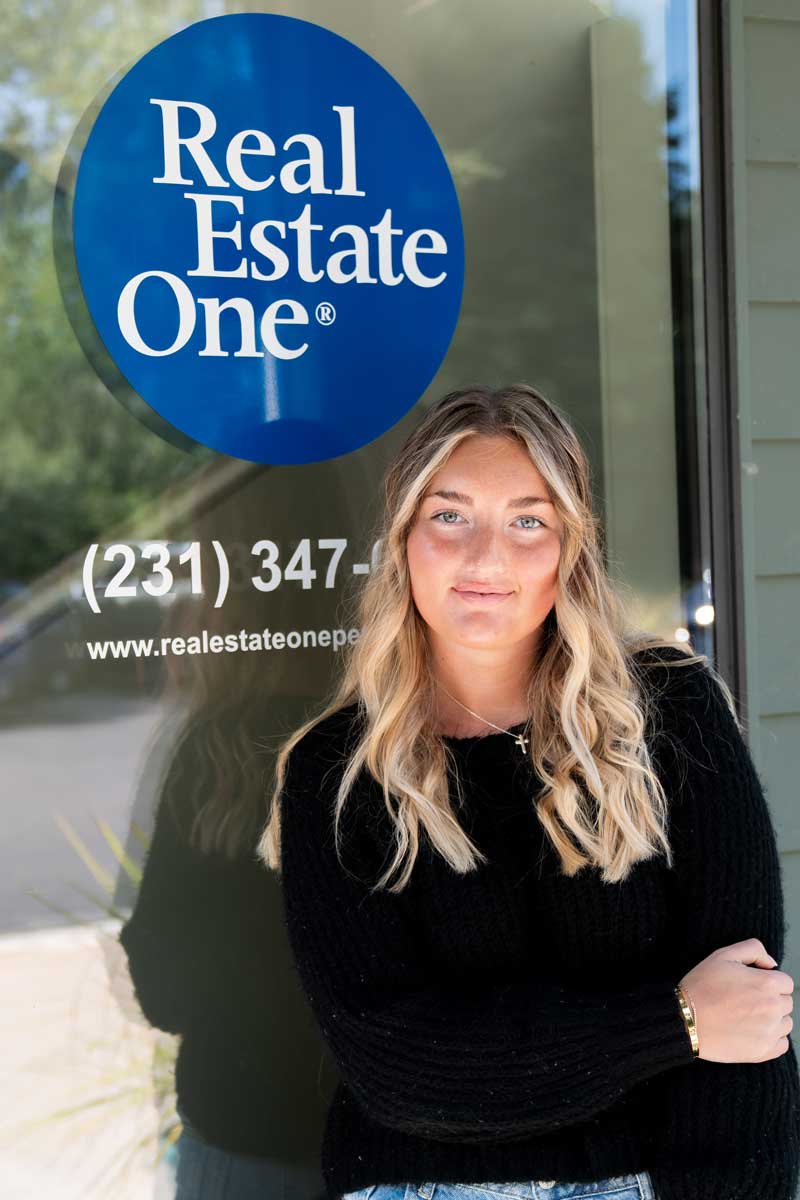 Photo of Lillian Sabin outside Real Estate One office