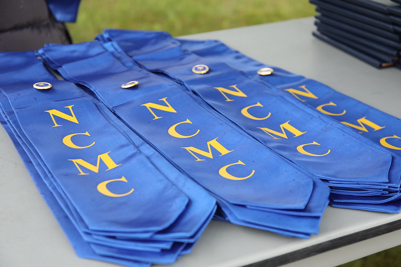 NCMC Nursing stoles displayed on table