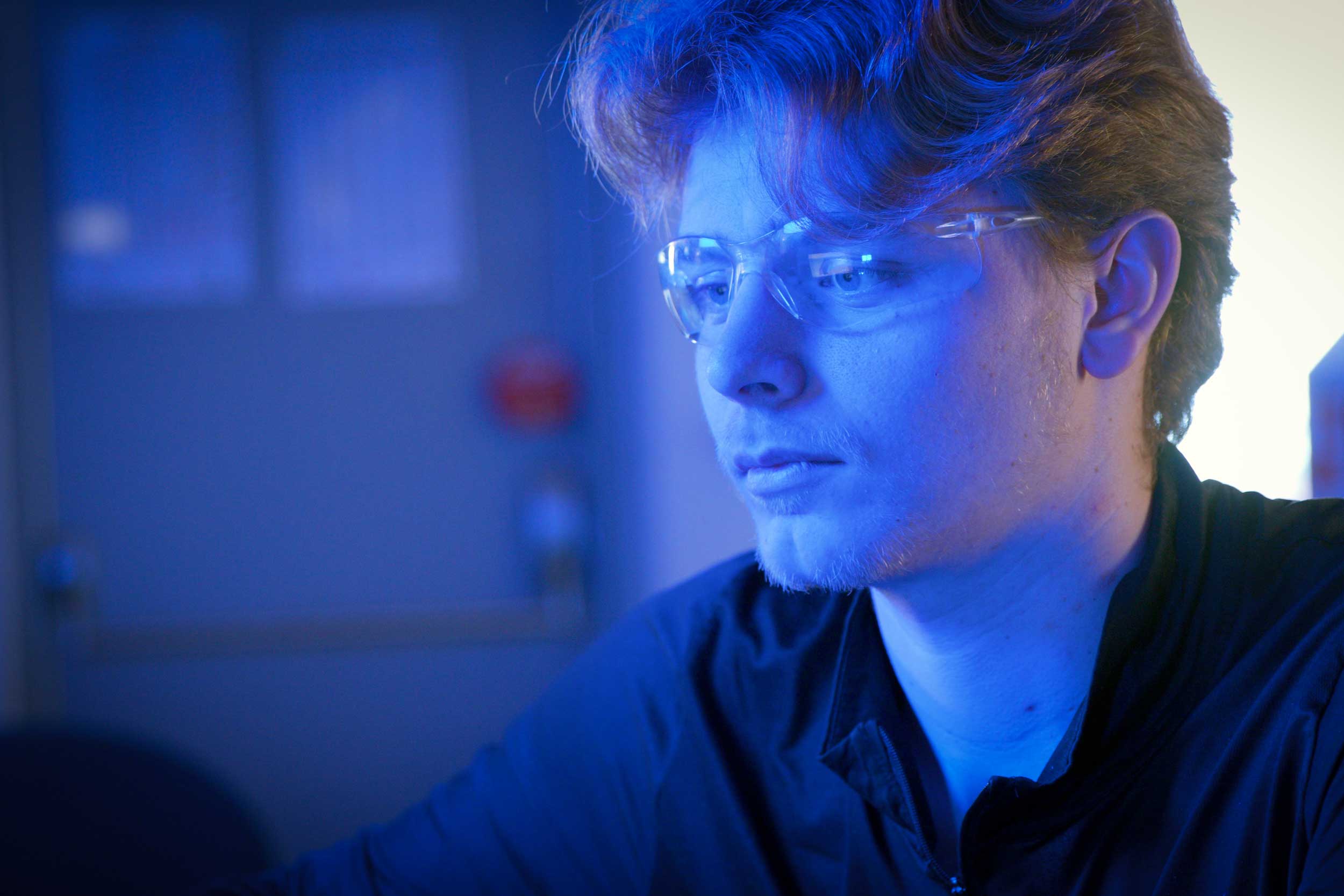 Engineer looking at a computer screen