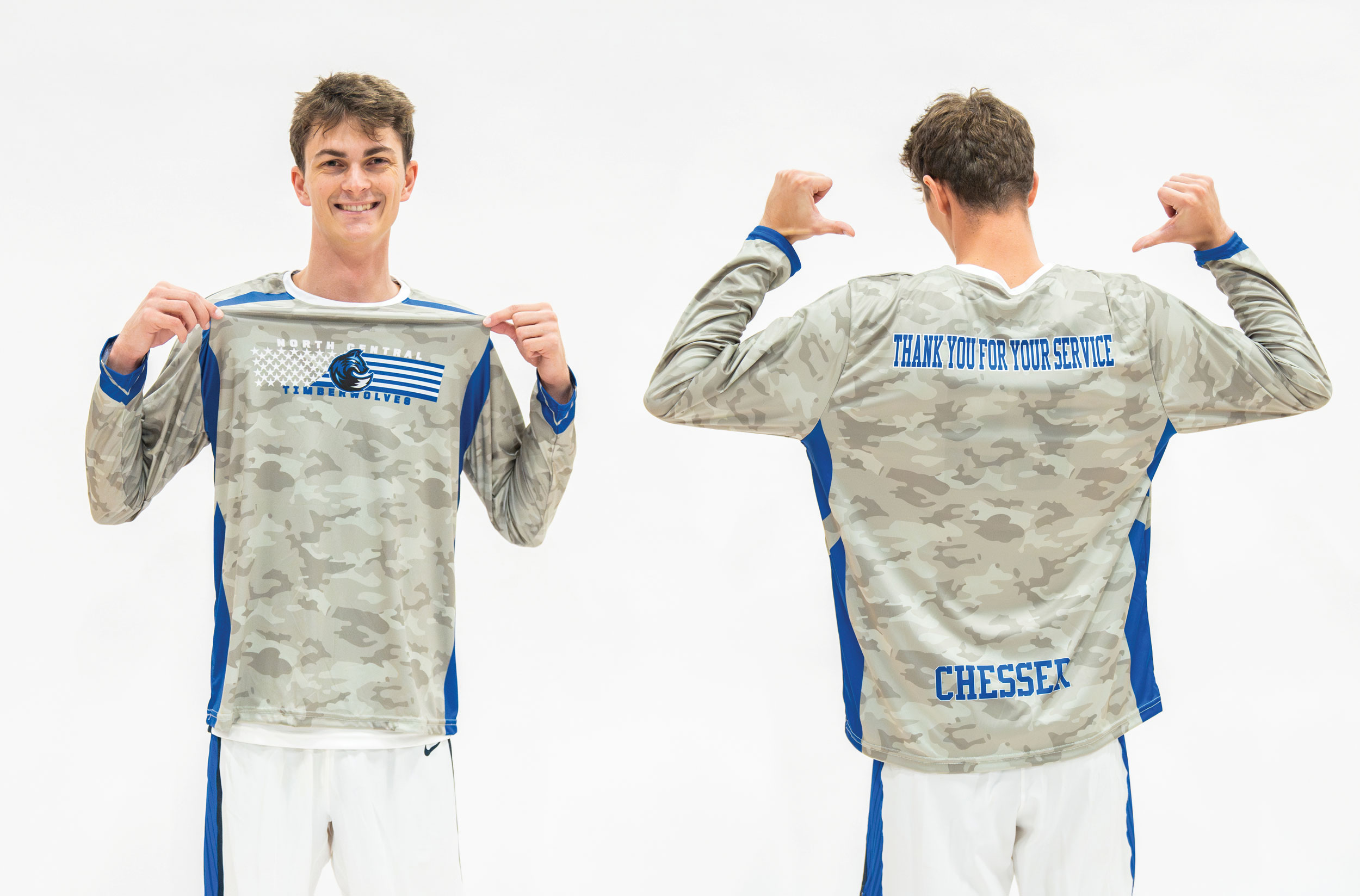 Student athlete wearing a camouflage warmup shirt for North Central Michigan College's Timberwolves, displaying the front and back of the shirt. The front features the college logo and a stylized American flag, while the back reads 'THANK YOU FOR YOUR SERVICE'