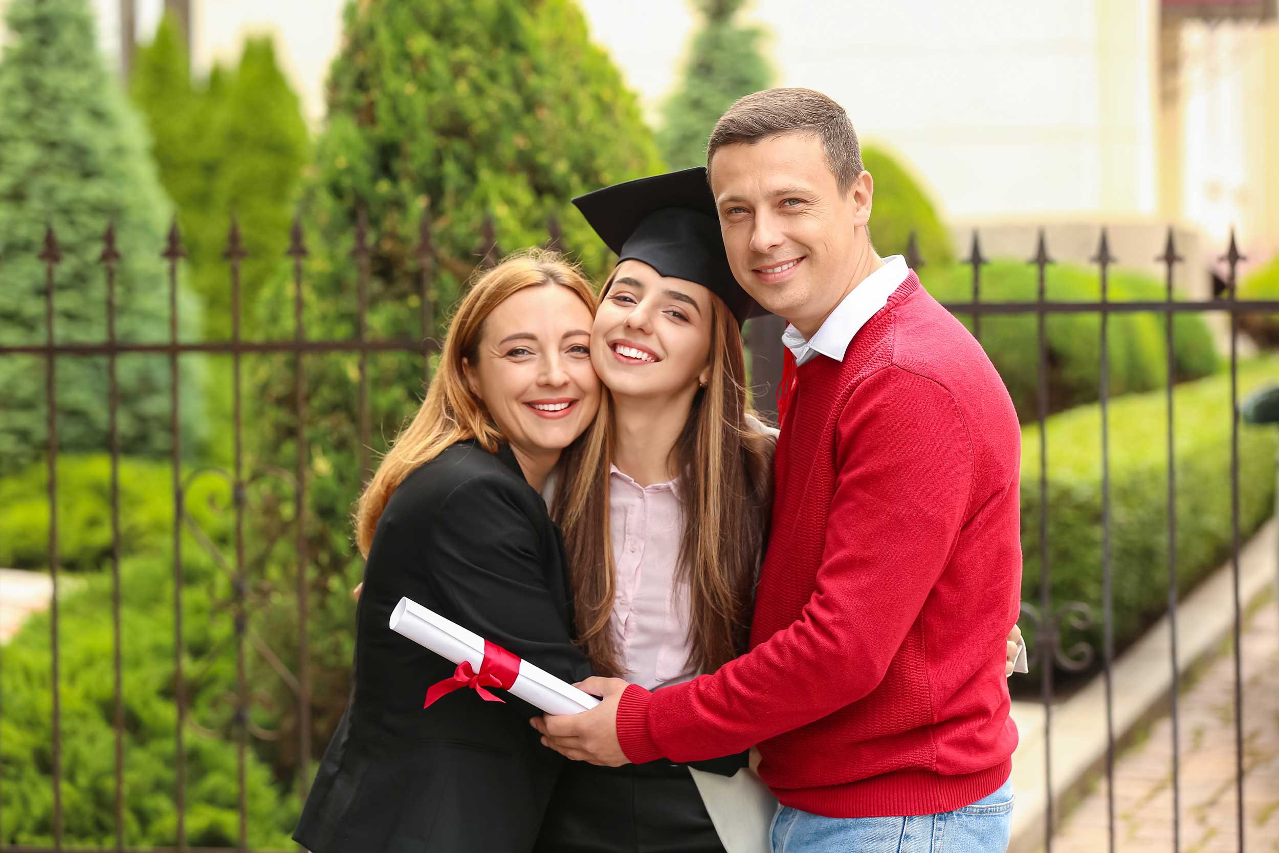 High school graduate with parents