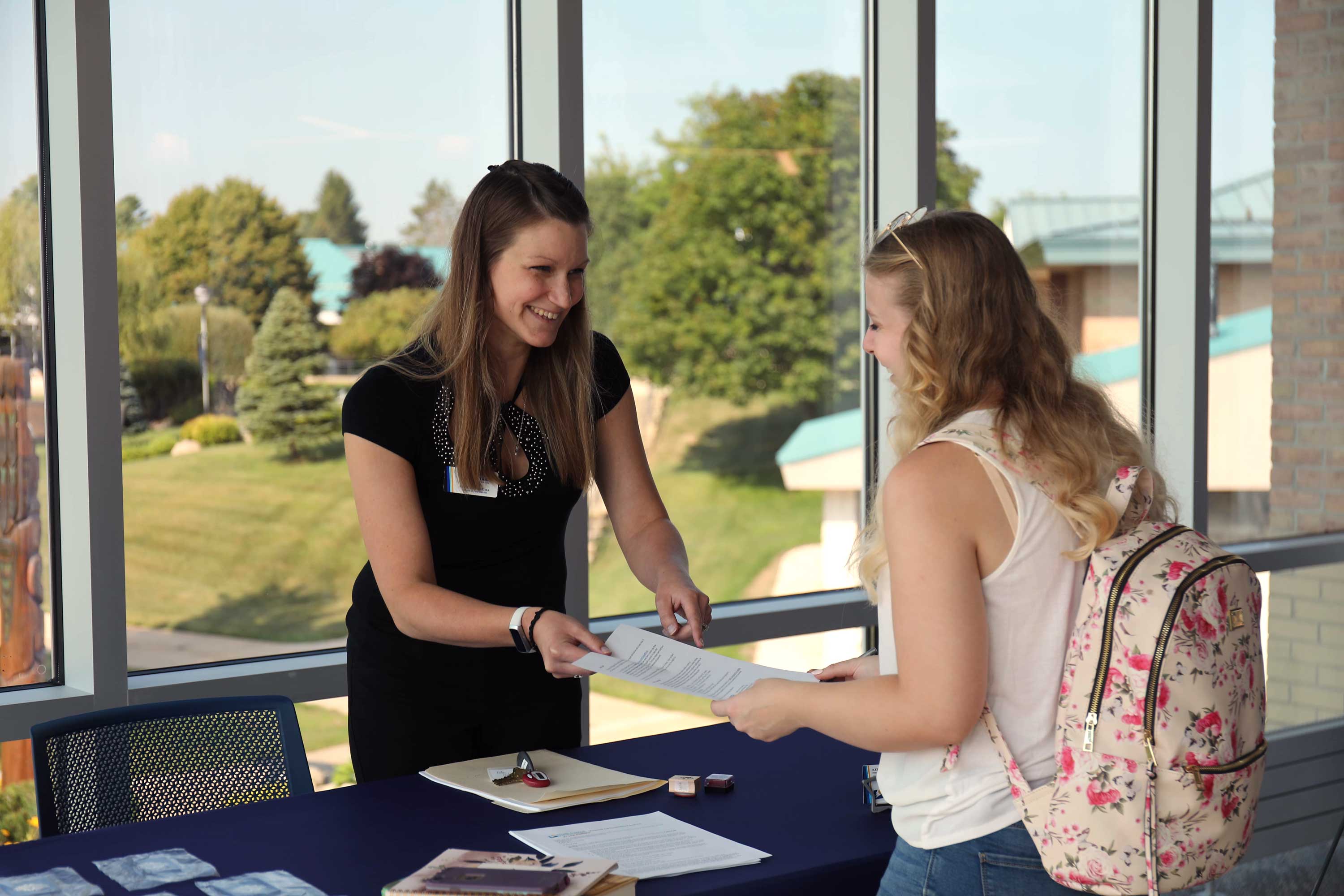 Student talking to advisor
