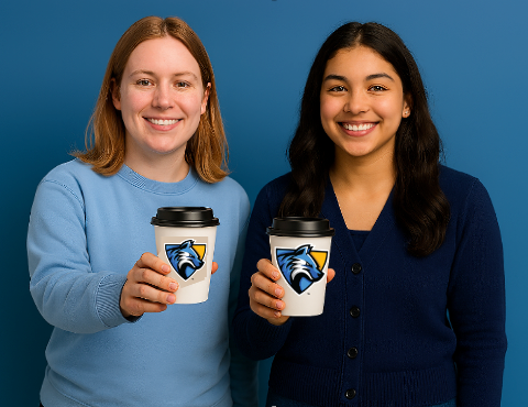 Two students holding cups of coffee