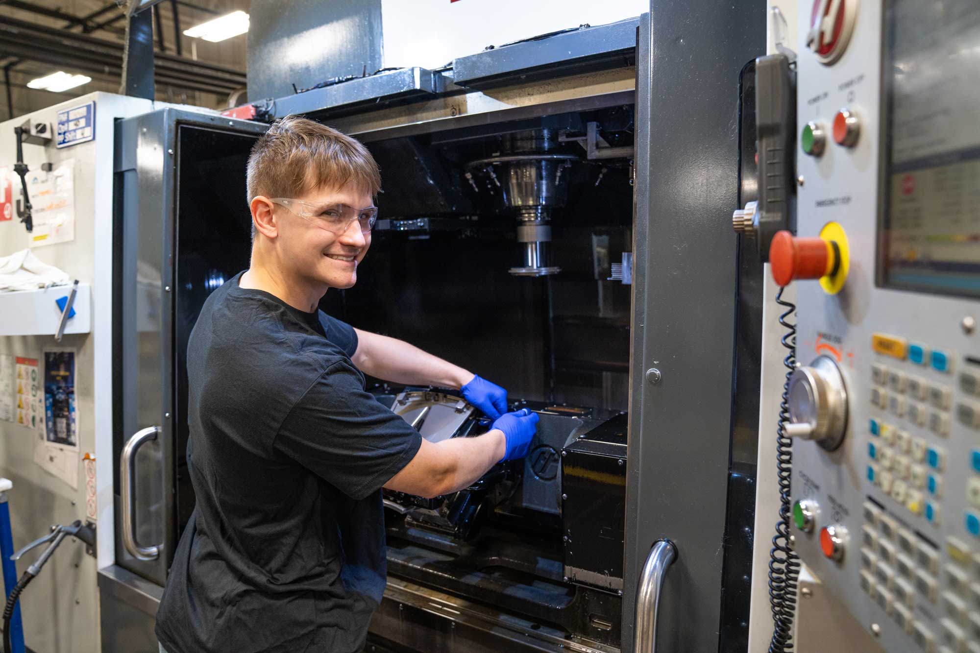 Man working at a CNC machine